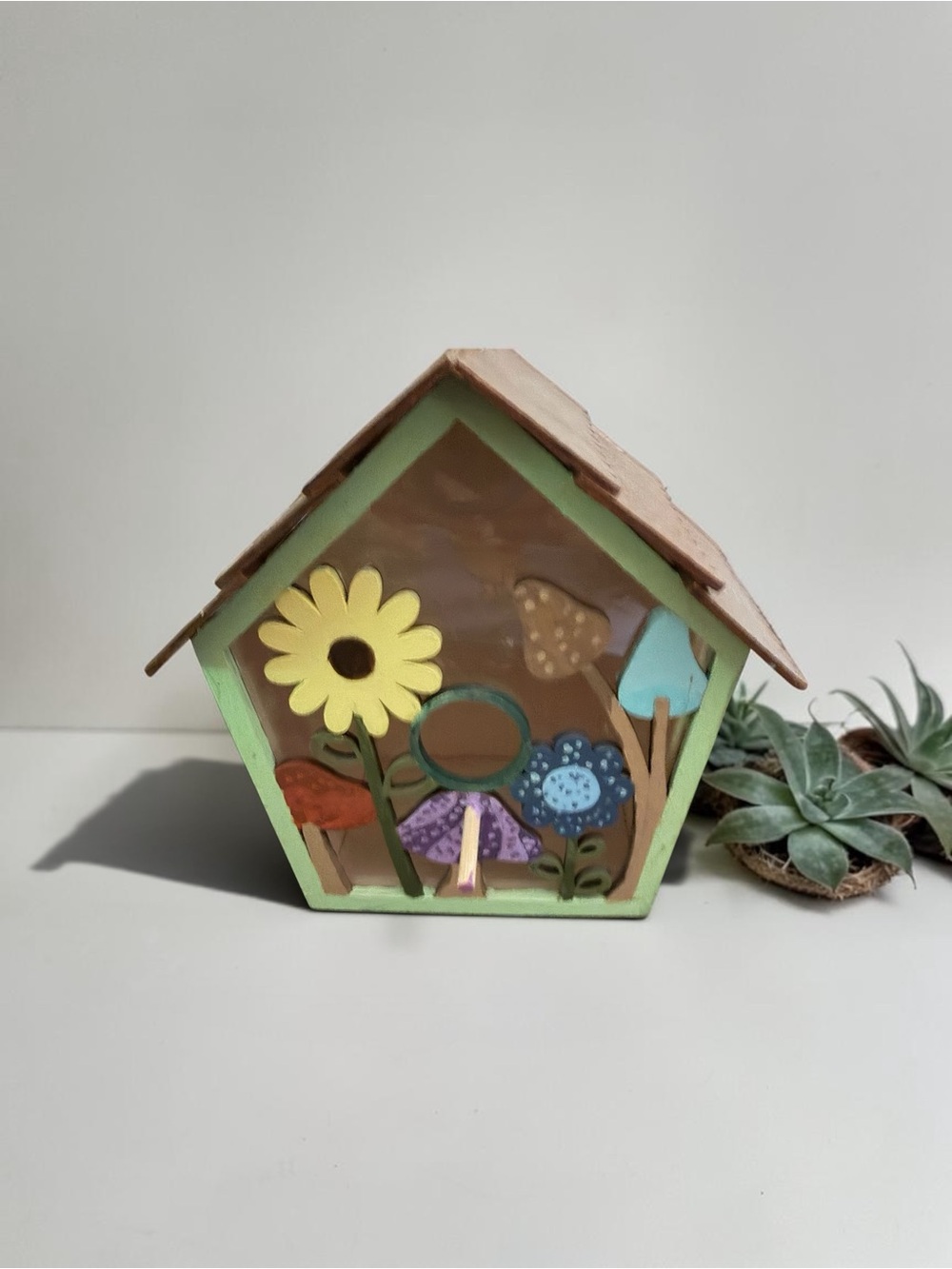 Hand-Painted Wooden Birdhouse with Colorful Floral Design
